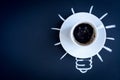 Concept coffee awakens brain on dark background top view