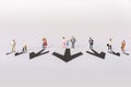 The concept of a collective solution to any problem. Miniature toy workers. Royalty Free Stock Photo