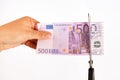 Concept of commission. Scissors cut banknote 500 euros inscription commission Royalty Free Stock Photo