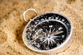 Concept compass in sand searching meaning of life Royalty Free Stock Photo