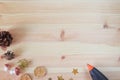 Concept of components for making christmas or winter decorations. Components designed on wooden board. Space for add text. Royalty Free Stock Photo