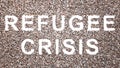 Concept or conceptual community of people forming the REFUGEE CRISIS message 3d illustration metaphor for safety from war