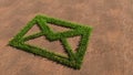 Green summer lawn grass symbol shape on brown soil or earth background, email sign Royalty Free Stock Photo