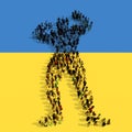 Large community of people forming the image a warrior on Ukrainian flag