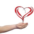 Painted red heart shape love symbol made by happy child at school, held in human man or woman hand Royalty Free Stock Photo