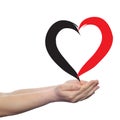 Painted red heart shape love symbol made by happy child at school, held in human man or woman hand Royalty Free Stock Photo