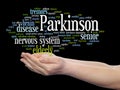 Parkinson`s disease healthcare or nervous system disorder abstract word cloud held in hands