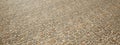 Conceptual solid beige background of stone texture floor as a vintage pattern layout.