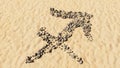 Stones on beach sand handmade symbol shape, golden sandy background, sagittarius zodiac sign Royalty Free Stock Photo