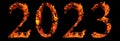 Conceptual 2023 year made of burning font on black background. An abstract 3D illustration as a metaphor for future