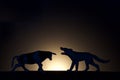 Concept conflict. Bull versus wolf silhouette