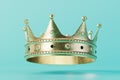 the concept of coronation. a large golden crown on a turquoise background. 3D render Royalty Free Stock Photo