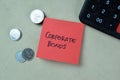 Concept of Corporate Bonds write on sticky notes isolated on Wooden Table