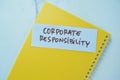 Concept of Corporate Responsibility write on sticky notes isolated on Wooden Table Royalty Free Stock Photo