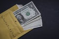The concept of corruption and bribery. Envelope full of american dollar banknotes. They bribe or blackmail. Royalty Free Stock Photo