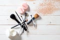 Concept of cosmetics and makeup with powder, skincare and brushes