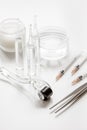 Concept cosmetologist desktop with mezoroller - mesotherapy on white background Royalty Free Stock Photo