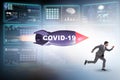 Concept of covid crisis with businessman chased by rocket Royalty Free Stock Photo