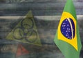 The concept of the COVID-19 epidemic in Brazil. a fragment of the flag of Brazil on a colored background with transparent