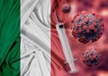 Concept Covid-19 immunization vaccine in Italy, a disease caused by the sars-cov-2 coronavirus. Syringe on Italy flag