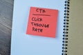 Concept of CTR - Click Through Rate write on sticky notes isolated on Wooden Table Royalty Free Stock Photo