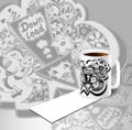 Concept with cup of coffee and down load doodle monsters in white black