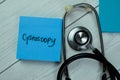 Concept of Cystoscopy write on sticky notes with stethoscope isolated on Wooden Table Royalty Free Stock Photo