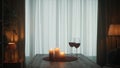 The concept of dating, joint recreation. Romantic evening. Candles are burning on the table next to glasses of red wine Royalty Free Stock Photo