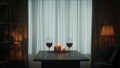 The concept of dating, joint recreation. Romantic evening. Candles are burning on the table next to glasses of red wine Royalty Free Stock Photo