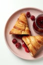 Concept of delicious food with croissant with raspberry jam on white background