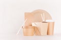 Concept design brown paper pack for go food for restaurant, cafe, shop, advertising - bowl, noodles box, cup, packet, plate. Royalty Free Stock Photo