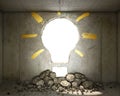 Concept of destroyed concrete wall in shape of light bulb. Royalty Free Stock Photo