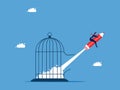 The concept of development and creativity in business. Businessman flies out of the cage with a pencil Royalty Free Stock Photo