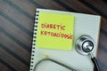 Concept of Diabetic Ketoacidosis write on sticky notes isolated on Wooden Table Royalty Free Stock Photo