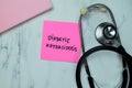 Concept of Diabetic Ketoacidosis write on sticky notes with stethoscope isolated on Wooden Table Royalty Free Stock Photo