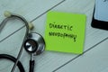 Concept of Diabetic Neuropathy write on sticky notes isolated on Wooden Table Royalty Free Stock Photo
