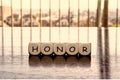 5 dices forming the Word honor Royalty Free Stock Photo