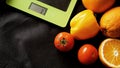 Concept diet. Healthy food, kitchen weight scale. Vegetables and fruits Royalty Free Stock Photo