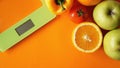 Concept diet. Healthy food, kitchen weight scale. Vegetables and fruits Royalty Free Stock Photo