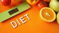 Concept diet. Healthy food, kitchen weight scale. Vegetables and fruits Royalty Free Stock Photo