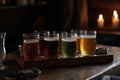 Different types of beer on the bar bar of the pub, beer assortment, cold different glasses of beer on the wooden table. Generative