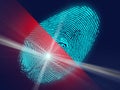 Concept of digital security, electronic fingerprint on scanning screen. Royalty Free Stock Photo