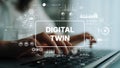 Concept of Digital Twin Technology with Data Visualization on Laptop for Modern Business Solutions and Innovations Royalty Free Stock Photo