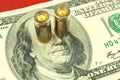 Concept of dirty money, Benjamin Franklin with bullets, caricature of bloody dollar Royalty Free Stock Photo