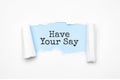 Concept of discovering HAVE YOUR SAY . Uncovered unrolled beige torn paper and search engine optimization abbreviation Royalty Free Stock Photo
