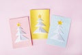 Concept of DIY and kid`s creativity, origami. Step by step instruction: how to make greeting cards with christmas trees origami. Royalty Free Stock Photo