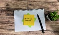 Concept of Do Not Lick The Desk write on sticky notes isolated on Wooden Table Royalty Free Stock Photo