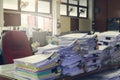 Concept of document workload, Pile of unfinished documents on office desk, Stack of business paper Royalty Free Stock Photo