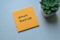 Concept of Domain Blacklist write on sticky notes isolated on Wooden Table