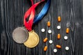 Concept of doping in sport - deprivation medals top view Royalty Free Stock Photo